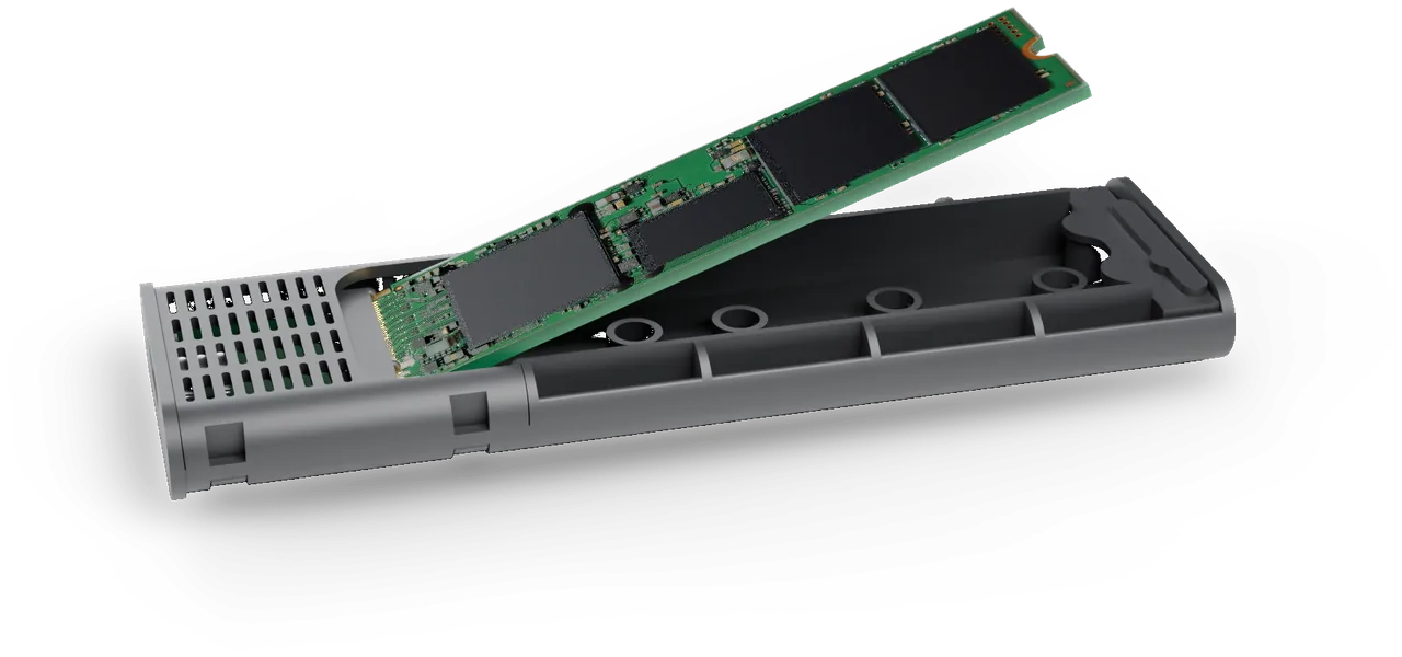 Tray with an M.2 SSD being pushed into the connector at an angle