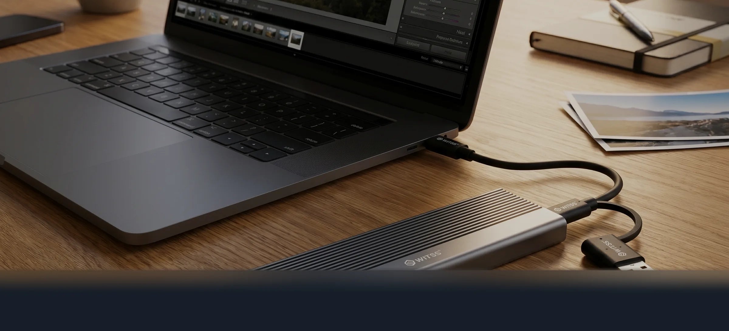 Switss M.2 SSD enclosure connected to a laptop while editing photos